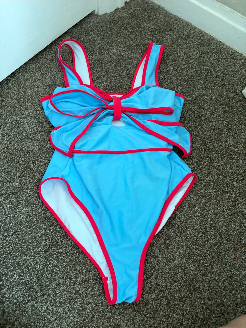Blue One-Piece Swimsuit with Pink Trim and Bow